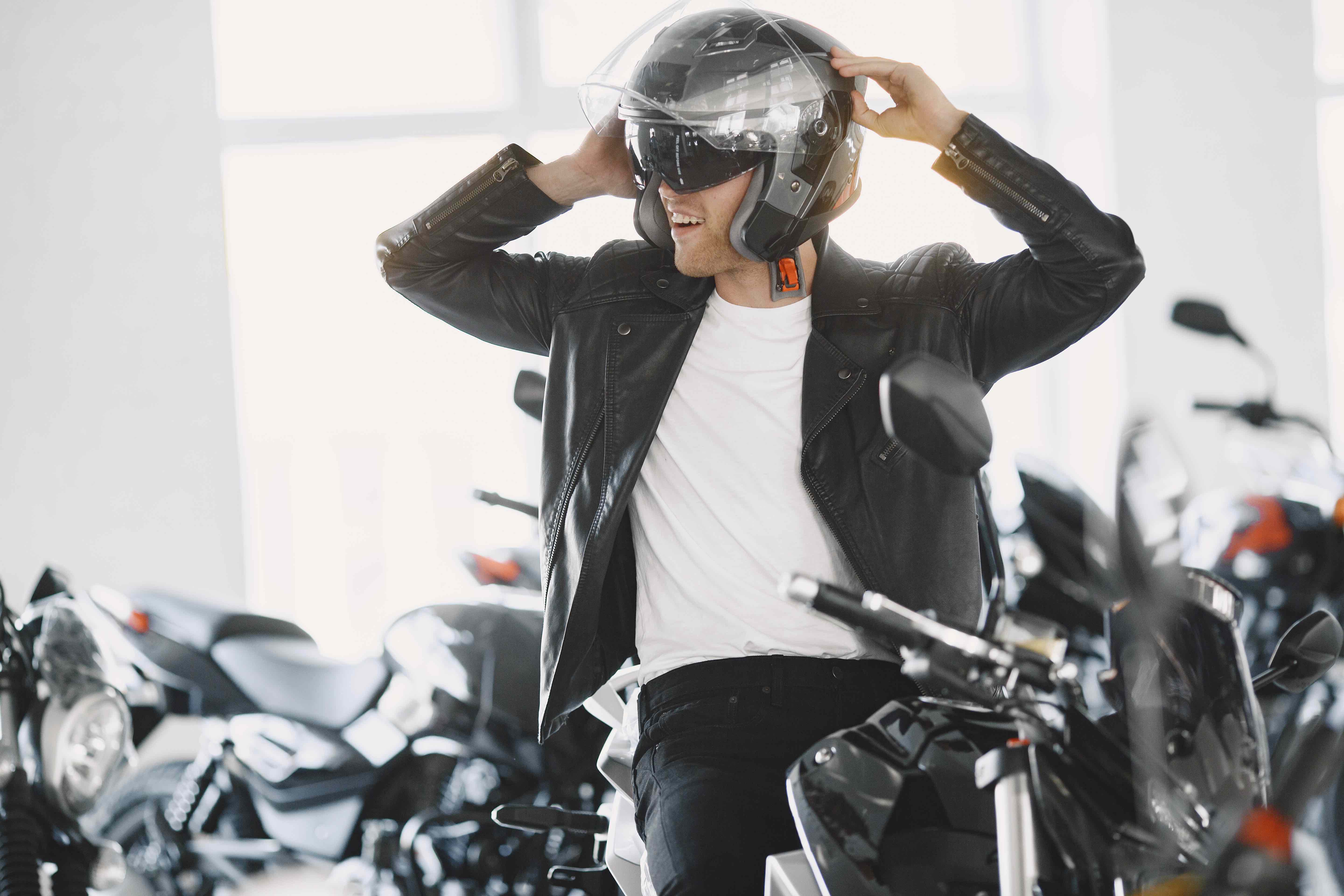 man choosed motorcycles moto shop guy black jacket man helmet